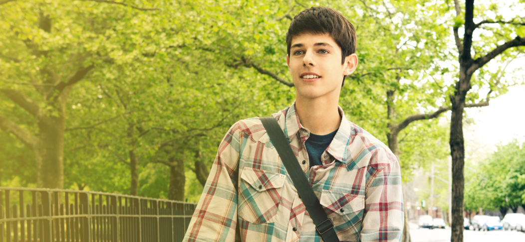 Young man walking in park